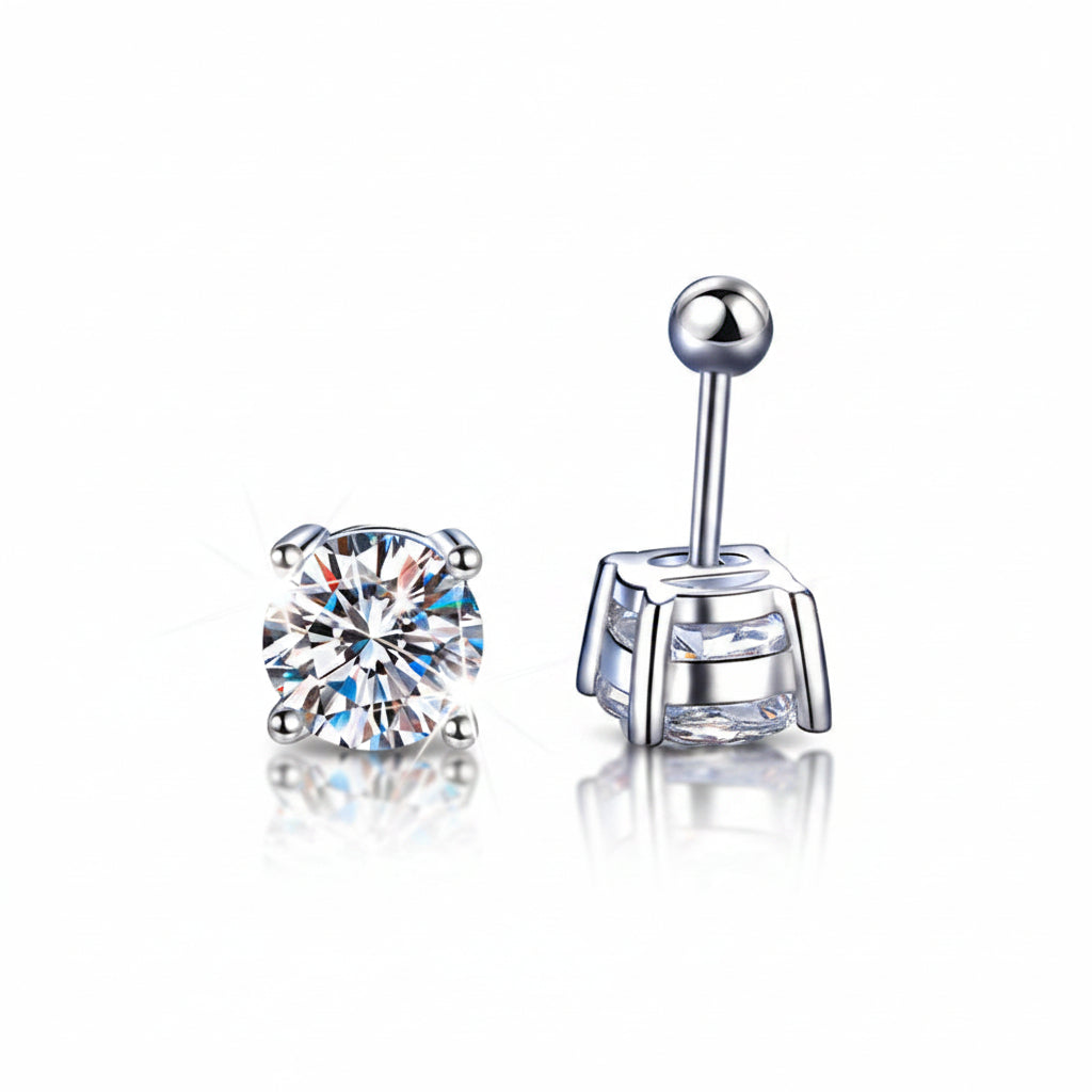 Two silver earrings with clear gemstones on a blue textured background